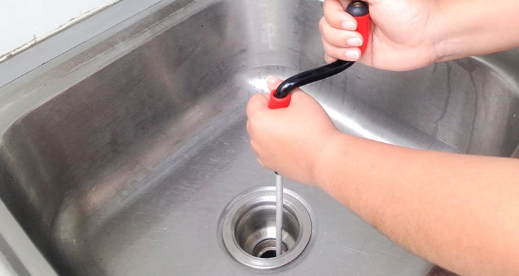 clear a blocked drain